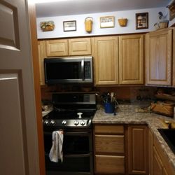Ron's Specialty Services LLC - Total kitchen makeover including both upper & lower cabinets.
