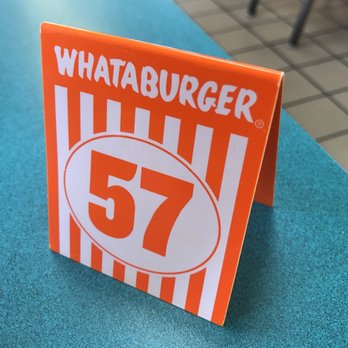 Whataburger - a sign on a table - Burgers Near Me - Corpus Christi, Texas Whataburger - a sign on a table - Burgers Near Me - Corpus Christi, Texas