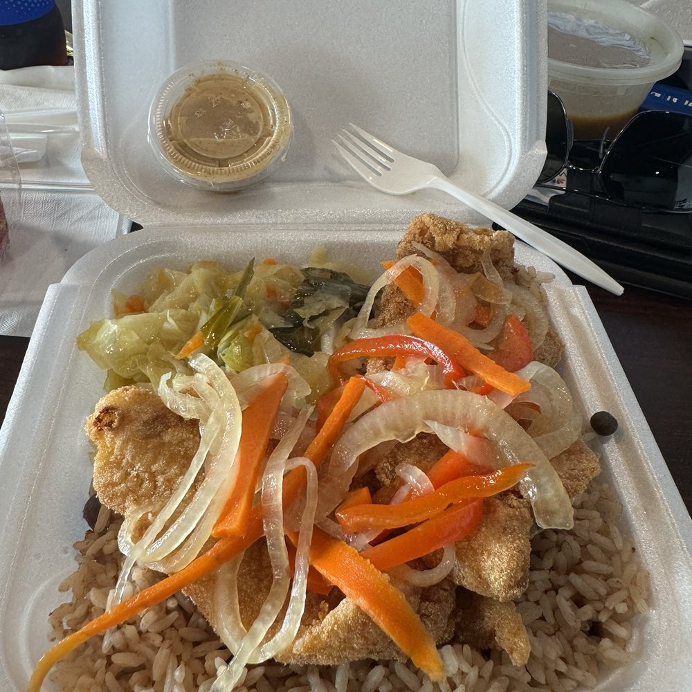 Swai eschoviech w/ rice and peas and cabbage