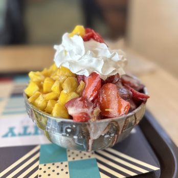 Snow City Cafe - a bowl of strawberries, corn, and whipped cream - Desserts Near Me - Carrollton, Texas Snow City Cafe - a bowl of strawberries, corn, and whipped cream - Desserts Near Me - Carrollton, Texas