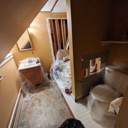 Ac's Odd Jobs And Maintenance - The platform where the toilet and shower previously were that was installed by somebody else