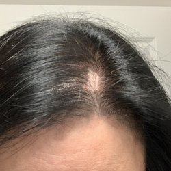 Missing color where my hair parts and very obvious. How could anyone not have seen this while they were washing and drying my hair?