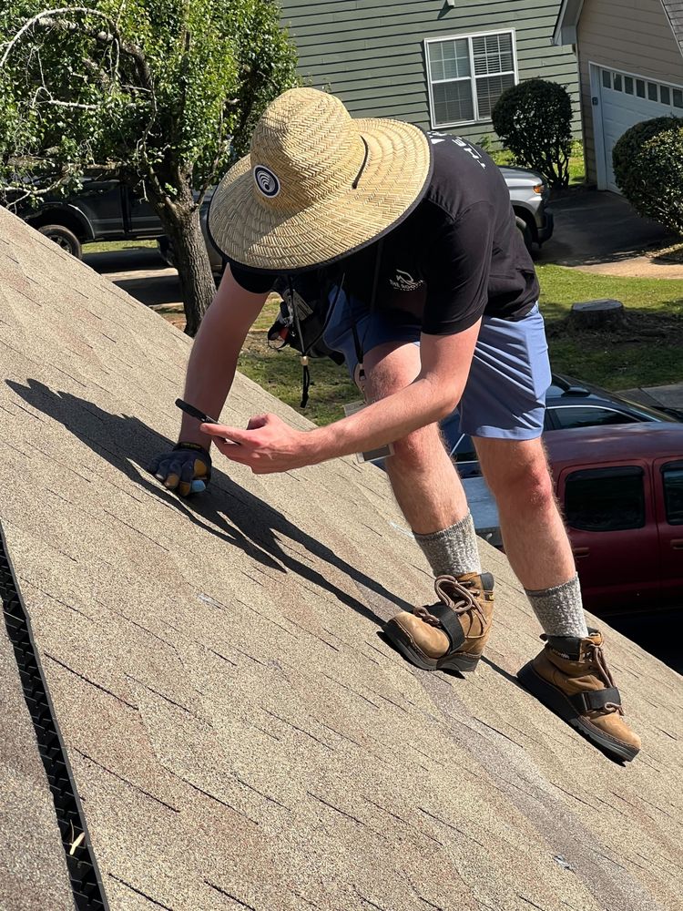 Slide of The Roofing Company