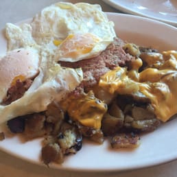 2 over easy with hash and home fries 2 over easy with hash and home fries