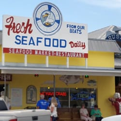 Pelican Point Seafood - Pelican Point is right on the traffic circle. Bring in your freshly-caught fish for cleaning, or buy theirs in the display cases