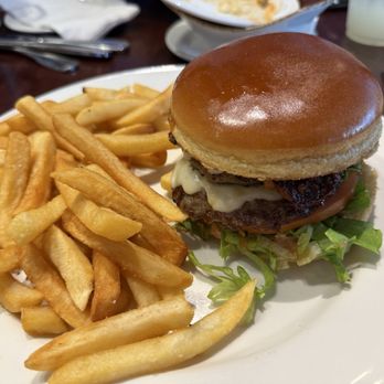 Hard Rock Cafe - Messi Burger with fries - American Near Me - Tampa, Florida Hard Rock Cafe - Messi Burger with fries - American Near Me - Tampa, Florida