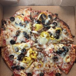 Veggie pizza with cauliflower crust Veggie pizza with cauliflower crust