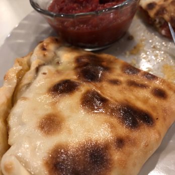 Richard's Brick Oven Pizza - Sausage and pepperoni calzone - Pizza Near Me - Franklin, Indiana Richard's Brick Oven Pizza - Sausage and pepperoni calzone - Pizza Near Me - Franklin, Indiana