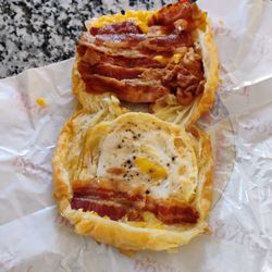 Yummy Donut Palace - Inside their bacon, egg and cheese breakfast sandwich. Plenty of bacon inside.