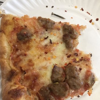 Rossville Pizzeria - a slice of pizza on a paper plate - Pizza Near Me - Staten Island, New York