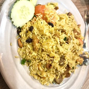 Siam Station - Pineapple Fried Rice with pork belly and beef - Thai Near Me - Irvine, California Siam Station - Pineapple Fried Rice with pork belly and beef - Thai Near Me - Irvine, California