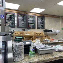 Carmines Italian Deli - Menu / register area
