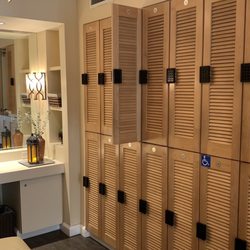 Women's lockers with small vanity area and toiletries