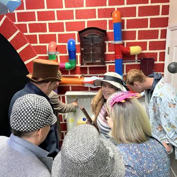 Boss-Play Escape Rooms - opening a clue - Escape Games Near Me - Oceanside, California Boss-Play Escape Rooms - opening a clue - Escape Games Near Me - Oceanside, California