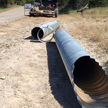 Rockin' W Tractor Services - pipe laying on the side of the road - General Contractors Near Me Rockin' W Tractor Services - pipe laying on the side of the road - General Contractors Near Me