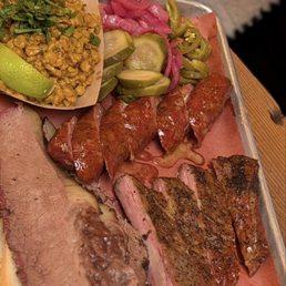 Brisker, ribs and Jalapeno Cheddar Sausage with one side. $70+ with one beer. Brisker, ribs and Jalapeno Cheddar Sausage with one side. $70+ with one beer.