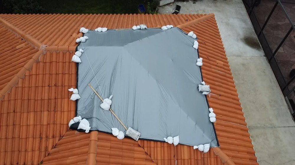 Slide of RoofTop Tarping