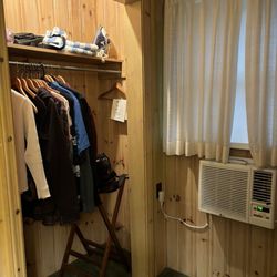 Azalea Garden Inn - Wall unit heat and AC. Closet with plenty of hangers, iron and ironing board (but no hair dryer in room)
