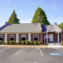 Conyers Family Dentist - Ample parking space and storefront view at Conyers Family Dentist