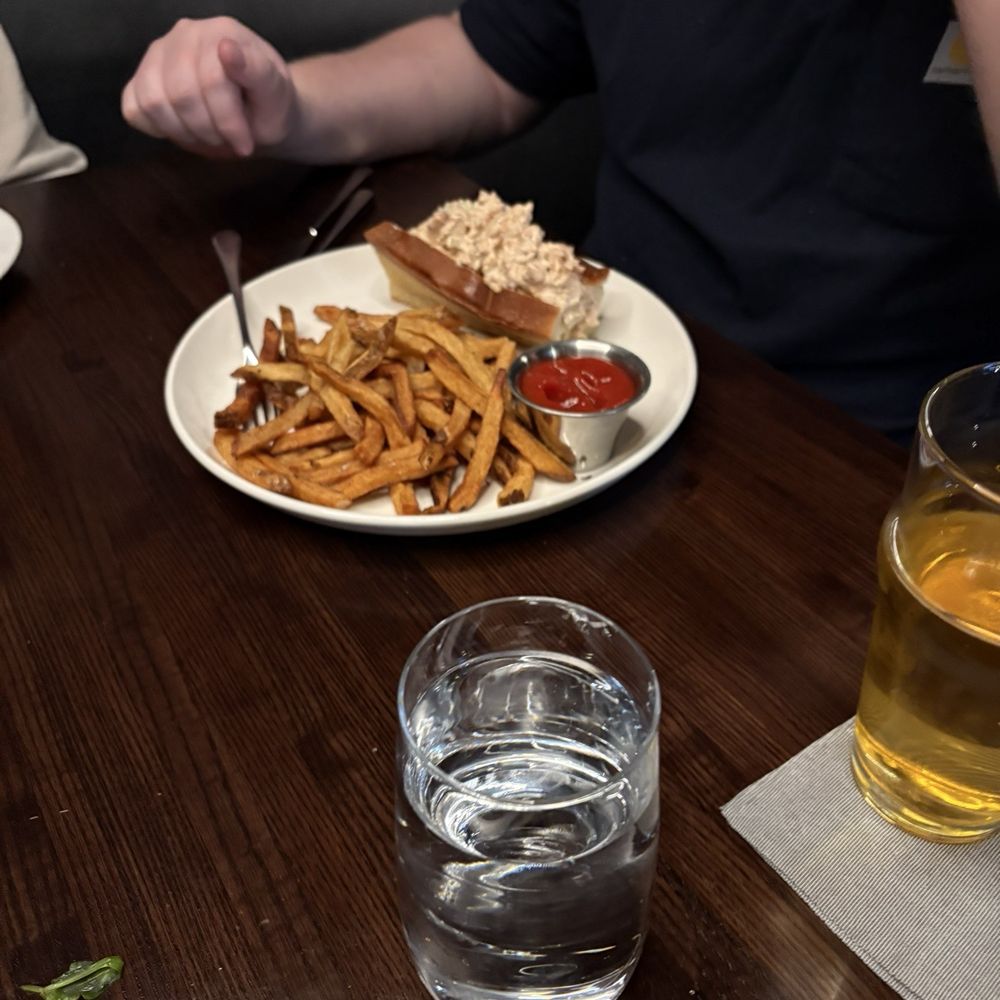 Lobster roll and French fries Lobster roll and French fries