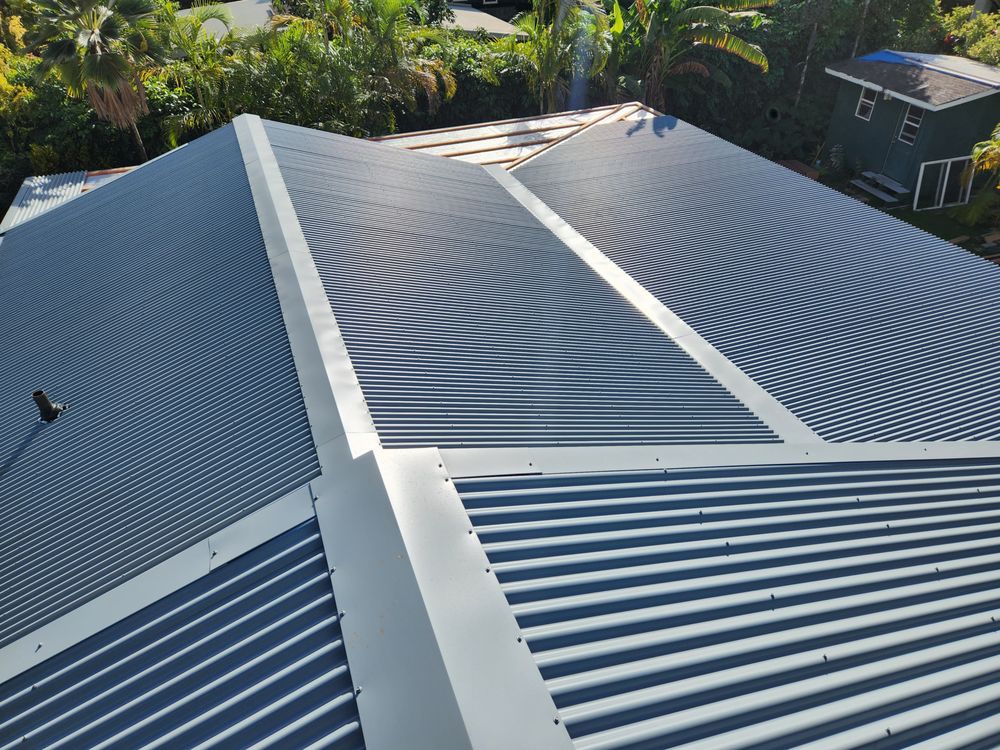 Slide of Metal Roof Pros-Kaua'i Roof Installers