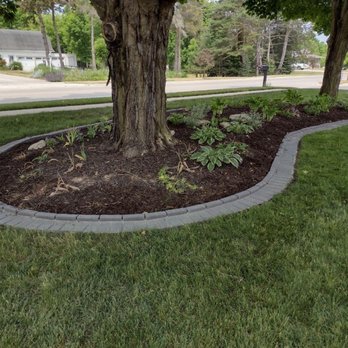 Yard beautiful - a tree in the middle of a flower bed - Landscaping Near Me Yard beautiful - a tree in the middle of a flower bed - Landscaping Near Me