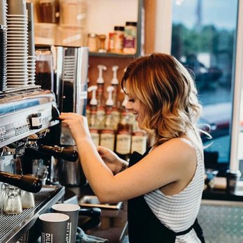 Airfield Espresso - a woman filling a cup of coffee - Coffee & Tea Near Me - Snohomish, Washington Airfield Espresso - a woman filling a cup of coffee - Coffee & Tea Near Me - Snohomish, Washington