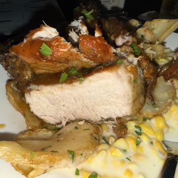 Parlour 1886 - The best porch chop ever!! Hand carved, 2" thick, tender with maple bourbon along with creamed corn & truffle fries! - American Near Me - Marion, Kansas Parlour 1886 - The best porch chop ever!! Hand carved, 2" thick, tender with maple bourbon along with creamed corn & truffle fries! - American Near Me - Marion, Kansas