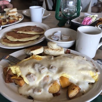 Campfire Grill - Campers platter with potatoes, gravy and biscuits on the side. And strawberry pancakes, must get their strawberry syrup! - American Near Me - Depew, New York