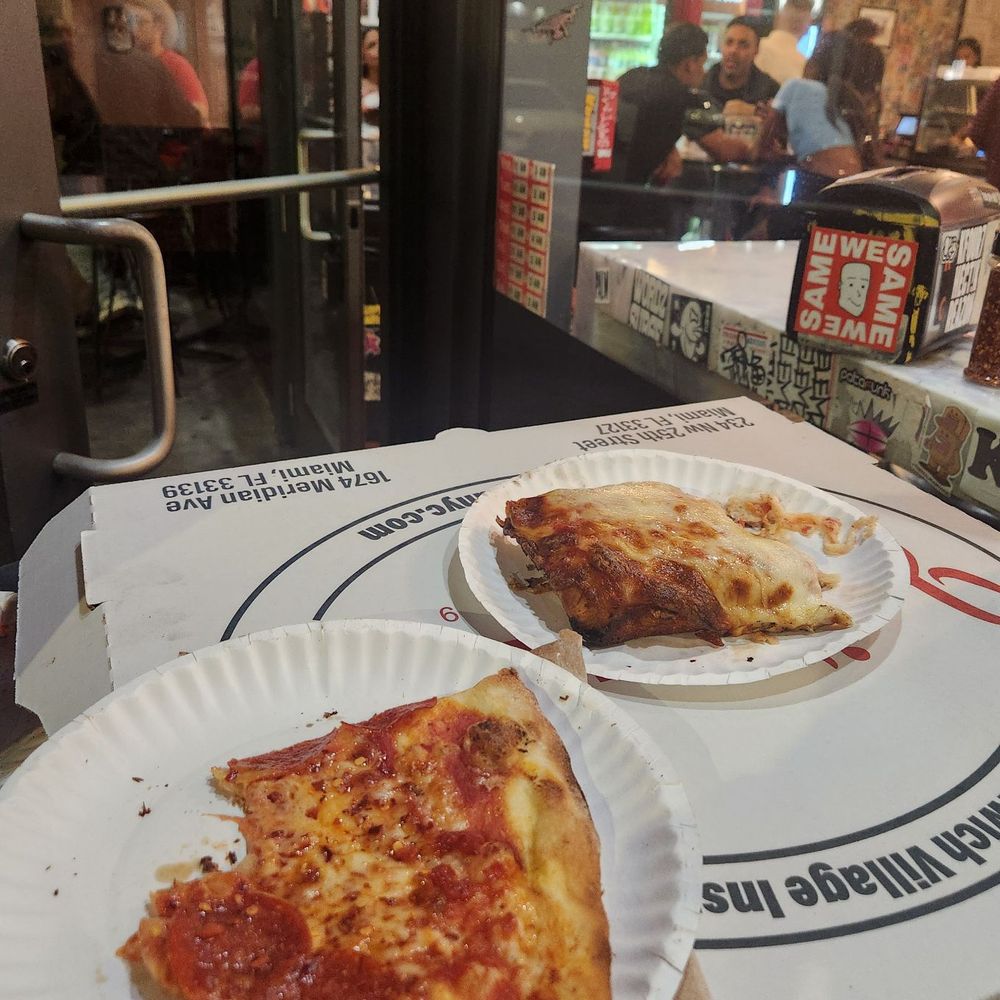 Joe's Pizza - Outdoor seating, we didn't make it to the car... - Pizza Near Me - Miami, Florida