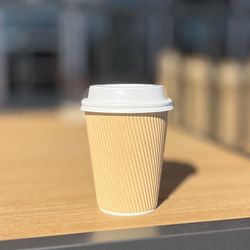 K&K Bakery - Cup of coffee in the outdoor seating area
