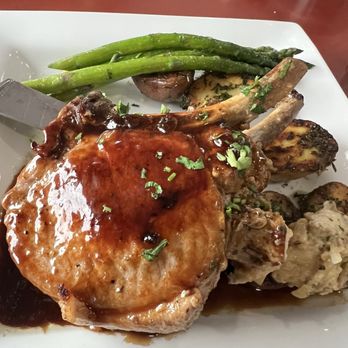 Ocean Prime Family Restaurant - Stuffed pork chops with a side of roasted potatoes and asparagus. - Steakhouses Near Me - Chehalis, Washington Ocean Prime Family Restaurant - Stuffed pork chops with a side of roasted potatoes and asparagus. - Steakhouses Near Me - Chehalis, Washington