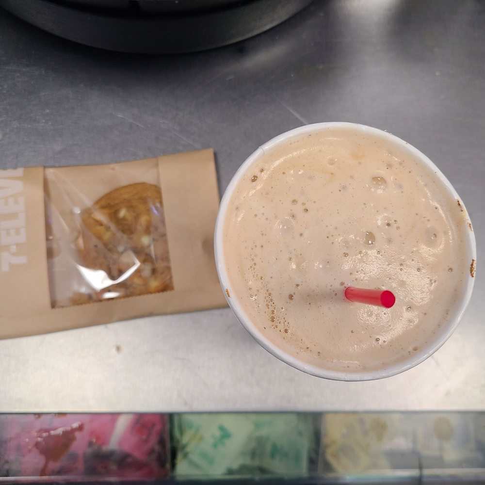 Flat white coffee and macadamia nut cookie
