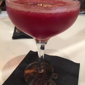 Pisco Y Nazca - Purple skies drink with vodka, triple sec, chicha morada, and lemon juice. - Gastropubs Near Me - Kendall, Florida