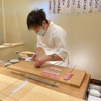 Tsuke Edomae - Chef in action slicing fish. - Sushi Bars Near Me - Austin, Texas Tsuke Edomae - Chef in action slicing fish. - Sushi Bars Near Me - Austin, Texas
