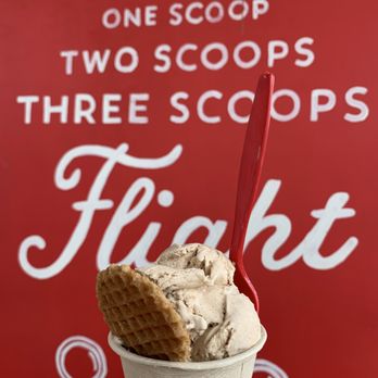 Mayday Ice Cream - Queen's salted caramel under a scoop of blueberry Cinnamon Toast Crunch ice cream in a cup. - Ice Cream & Frozen Yogurt Near Me - Jacksonville, Florida