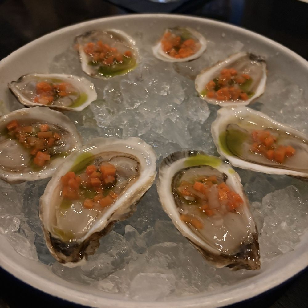 Cordelia - New Skool Oysters (carrot and cardamom minionette) - New American Near Me - Cleveland, Ohio Cordelia - New Skool Oysters (carrot and cardamom minionette) - New American Near Me - Cleveland, Ohio
