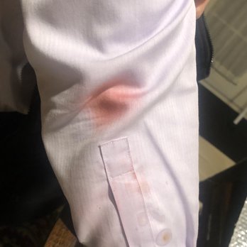 Congee Village - Damage from the one time use table cloth to my husbands dress shirt. - Cantonese Near Me - Flushing, New York