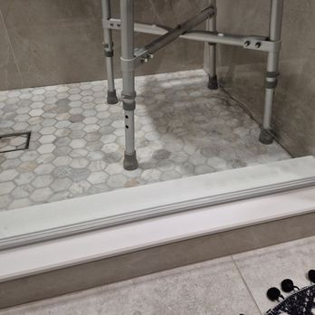 Across Town Glass & Mirror - Clean new acrylic water barrier on glass shower door - Windows Installation Near Me - Palantine, Illinois Across Town Glass & Mirror - Clean new acrylic water barrier on glass shower door - Windows Installation Near Me - Palantine, Illinois