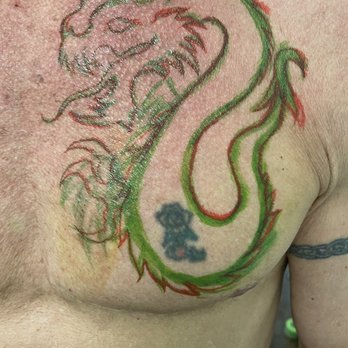 Paper Crane Studio - Don designed this dragon to cover up a forty year old tattoo. - Tattoo Near Me - Long Beach, California Paper Crane Studio - Don designed this dragon to cover up a forty year old tattoo. - Tattoo Near Me - Long Beach, California