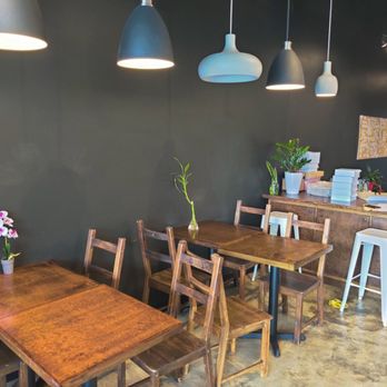 Donuts Now - a table and chairs in a restaurant - Donuts Near Me - Buford, Georgia