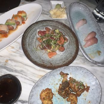 Q Sushi - Sunset roll (top left), poke roll (center), tempura cauliflower, nigiri - Japanese Near Me - Westlake Village, California