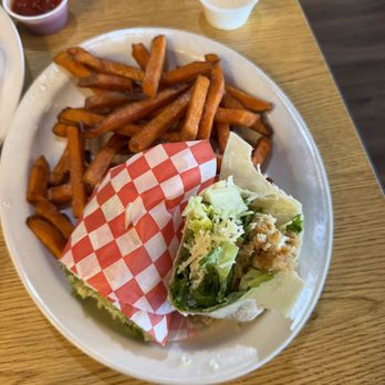 Topaz Lodge Steakhouse - Chicken caesar wrap with a side of sweet potato fries. The chicken and fries were extremely fresh and delicious. - Steakhouses Near Me - Gardnerville, Nevada Topaz Lodge Steakhouse - Chicken caesar wrap with a side of sweet potato fries. The chicken and fries were extremely fresh and delicious. - Steakhouses Near Me - Gardnerville, Nevada