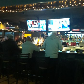 Monelli's - Bar area. - Italian Near Me - Portage, Michigan Monelli's - Bar area. - Italian Near Me - Portage, Michigan