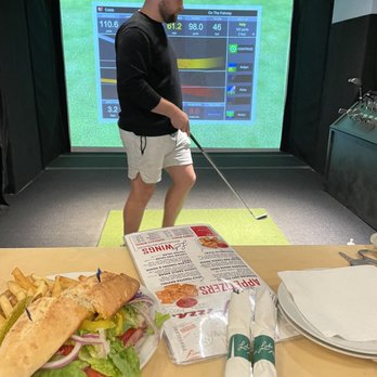 Rounds Golf & Lounge - Bay in action. - Lounges Near Me - Wilmington, North Carolina Rounds Golf & Lounge - Bay in action. - Lounges Near Me - Wilmington, North Carolina