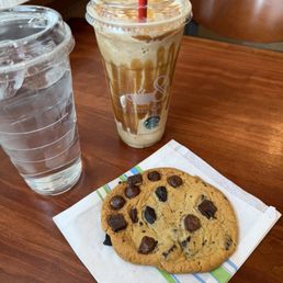 Fenty caramel Frappuccino with extra caramel, no whipped cream. Chocolate chip cookie and a water.