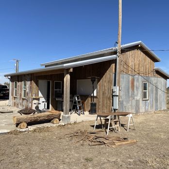 Enns Construction - Rustic metal and wood siding for a mancave - General Contractors Near Me Enns Construction - Rustic metal and wood siding for a mancave - General Contractors Near Me