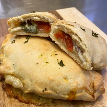 Delta Hand Pies - The new Vine ripened Delta tomatoes, fresh mozzarella cheese, and basil chiffonade Hand Pie - Desserts Near Me - Sacramento, California Delta Hand Pies - The new Vine ripened Delta tomatoes, fresh mozzarella cheese, and basil chiffonade Hand Pie - Desserts Near Me - Sacramento, California