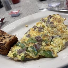 Philly cheesesteak omelet with raisin toast.  No hashbrowns/homefries.