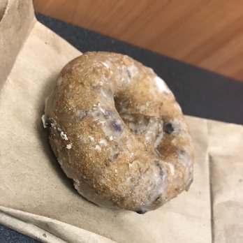 Donut Palace - a doughnut on a brown paper bag - Donuts Near Me - Junction City, Kansas Donut Palace - a doughnut on a brown paper bag - Donuts Near Me - Junction City, Kansas